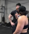 Rhea_Ripley_flexes_on_Sheamus_with_her__Nightmare__Arms_workout_3669.jpg