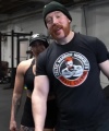 Rhea_Ripley_flexes_on_Sheamus_with_her__Nightmare__Arms_workout_3677.jpg