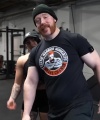 Rhea_Ripley_flexes_on_Sheamus_with_her__Nightmare__Arms_workout_3678.jpg