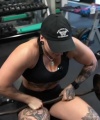 Rhea_Ripley_flexes_on_Sheamus_with_her__Nightmare__Arms_workout_3750.jpg