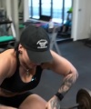 Rhea_Ripley_flexes_on_Sheamus_with_her__Nightmare__Arms_workout_3751.jpg