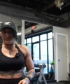 Rhea_Ripley_flexes_on_Sheamus_with_her__Nightmare__Arms_workout_3757.jpg