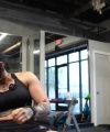 Rhea_Ripley_flexes_on_Sheamus_with_her__Nightmare__Arms_workout_3758.jpg