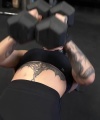 Rhea_Ripley_flexes_on_Sheamus_with_her__Nightmare__Arms_workout_3760.jpg
