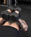Rhea_Ripley_flexes_on_Sheamus_with_her__Nightmare__Arms_workout_3765.jpg