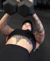 Rhea_Ripley_flexes_on_Sheamus_with_her__Nightmare__Arms_workout_3767.jpg