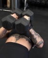Rhea_Ripley_flexes_on_Sheamus_with_her__Nightmare__Arms_workout_3772.jpg