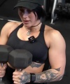 Rhea_Ripley_flexes_on_Sheamus_with_her__Nightmare__Arms_workout_3780.jpg
