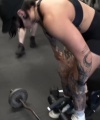 Rhea_Ripley_flexes_on_Sheamus_with_her__Nightmare__Arms_workout_3787.jpg
