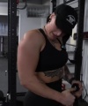 Rhea_Ripley_flexes_on_Sheamus_with_her__Nightmare__Arms_workout_3810.jpg