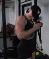 Rhea_Ripley_flexes_on_Sheamus_with_her__Nightmare__Arms_workout_3813.jpg