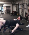 Rhea_Ripley_flexes_on_Sheamus_with_her__Nightmare__Arms_workout_3850.jpg
