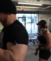 Rhea_Ripley_flexes_on_Sheamus_with_her__Nightmare__Arms_workout_3872.jpg