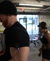 Rhea_Ripley_flexes_on_Sheamus_with_her__Nightmare__Arms_workout_3873.jpg