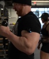 Rhea_Ripley_flexes_on_Sheamus_with_her__Nightmare__Arms_workout_3877.jpg