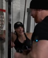 Rhea_Ripley_flexes_on_Sheamus_with_her__Nightmare__Arms_workout_3927.jpg