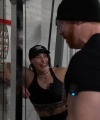 Rhea_Ripley_flexes_on_Sheamus_with_her__Nightmare__Arms_workout_3928.jpg