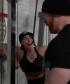 Rhea_Ripley_flexes_on_Sheamus_with_her__Nightmare__Arms_workout_3929.jpg