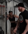 Rhea_Ripley_flexes_on_Sheamus_with_her__Nightmare__Arms_workout_3939.jpg