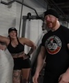 Rhea_Ripley_flexes_on_Sheamus_with_her__Nightmare__Arms_workout_3941.jpg