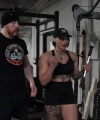 Rhea_Ripley_flexes_on_Sheamus_with_her__Nightmare__Arms_workout_3955.jpg
