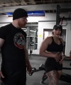 Rhea_Ripley_flexes_on_Sheamus_with_her__Nightmare__Arms_workout_3992.jpg
