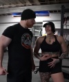 Rhea_Ripley_flexes_on_Sheamus_with_her__Nightmare__Arms_workout_3997.jpg