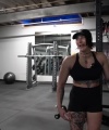 Rhea_Ripley_flexes_on_Sheamus_with_her__Nightmare__Arms_workout_4012.jpg