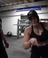 Rhea_Ripley_flexes_on_Sheamus_with_her__Nightmare__Arms_workout_4021.jpg