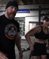 Rhea_Ripley_flexes_on_Sheamus_with_her__Nightmare__Arms_workout_4025.jpg