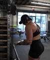 Rhea_Ripley_flexes_on_Sheamus_with_her__Nightmare__Arms_workout_4101.jpg