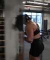 Rhea_Ripley_flexes_on_Sheamus_with_her__Nightmare__Arms_workout_4102.jpg