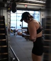 Rhea_Ripley_flexes_on_Sheamus_with_her__Nightmare__Arms_workout_4103.jpg