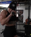 Rhea_Ripley_flexes_on_Sheamus_with_her__Nightmare__Arms_workout_4210.jpg
