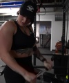 Rhea_Ripley_flexes_on_Sheamus_with_her__Nightmare__Arms_workout_4214.jpg