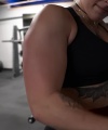 Rhea_Ripley_flexes_on_Sheamus_with_her__Nightmare__Arms_workout_4226.jpg