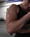 Rhea_Ripley_flexes_on_Sheamus_with_her__Nightmare__Arms_workout_4227.jpg