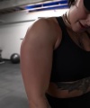 Rhea_Ripley_flexes_on_Sheamus_with_her__Nightmare__Arms_workout_4230.jpg
