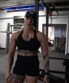 Rhea_Ripley_flexes_on_Sheamus_with_her__Nightmare__Arms_workout_4240.jpg