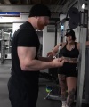 Rhea_Ripley_flexes_on_Sheamus_with_her__Nightmare__Arms_workout_4242.jpg