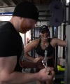 Rhea_Ripley_flexes_on_Sheamus_with_her__Nightmare__Arms_workout_4308.jpg
