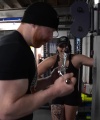 Rhea_Ripley_flexes_on_Sheamus_with_her__Nightmare__Arms_workout_4309.jpg