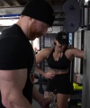 Rhea_Ripley_flexes_on_Sheamus_with_her__Nightmare__Arms_workout_4311.jpg