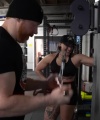 Rhea_Ripley_flexes_on_Sheamus_with_her__Nightmare__Arms_workout_4313.jpg