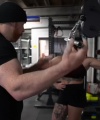 Rhea_Ripley_flexes_on_Sheamus_with_her__Nightmare__Arms_workout_4315.jpg