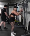 Rhea_Ripley_flexes_on_Sheamus_with_her__Nightmare__Arms_workout_4415.jpg