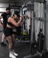 Rhea_Ripley_flexes_on_Sheamus_with_her__Nightmare__Arms_workout_4418.jpg