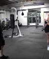 Rhea_Ripley_flexes_on_Sheamus_with_her__Nightmare__Arms_workout_4492.jpg