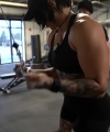 Rhea_Ripley_flexes_on_Sheamus_with_her__Nightmare__Arms_workout_4527.jpg