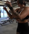 Rhea_Ripley_flexes_on_Sheamus_with_her__Nightmare__Arms_workout_4529.jpg